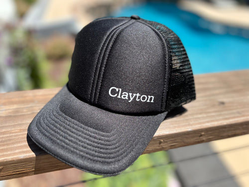 Black Location Snap Back Trucker Hat